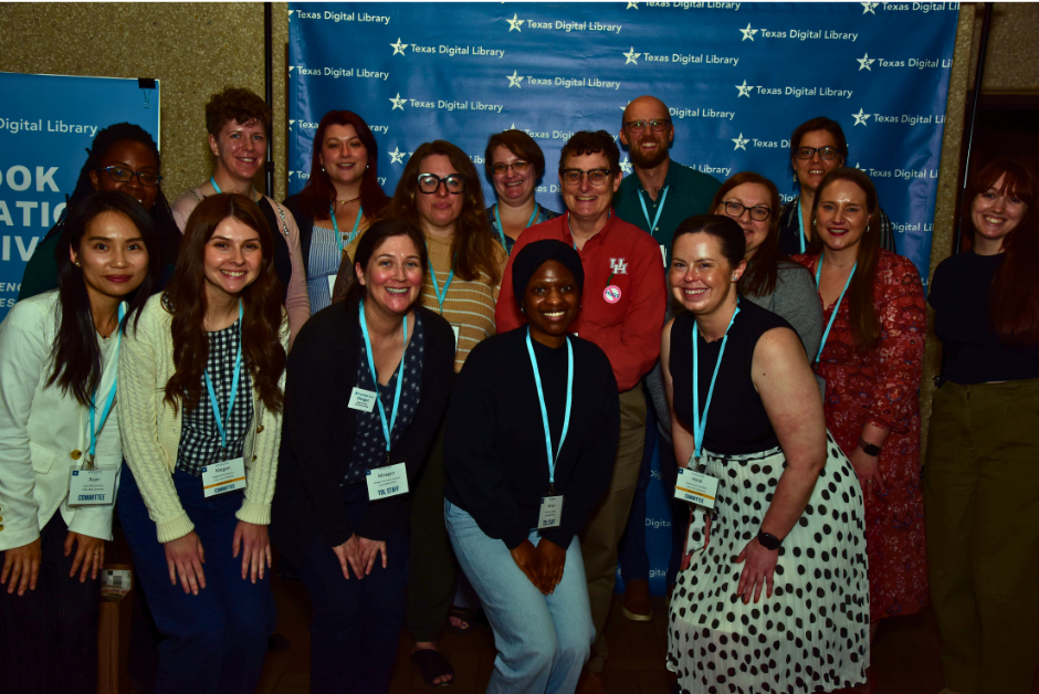 Photo of the TCDL 2025 planning committee against the Texas Digital Library backdrop.